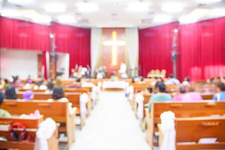 Blurred interior of church with many peopleのeditorial素材