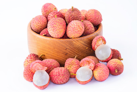 Fresh lychee in bowl on a wooden の写真素材