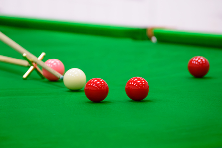 Player was shooting ball on snooker table