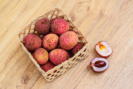 Fresh lychee on a wooden backgroundの写真素材