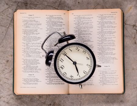 Alarm clock and Holy bibleの写真素材