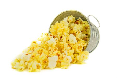 Popcorn in a zinc bucket on white background, focus DOFの写真素材