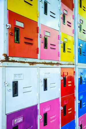 Rows of different colors metal lockersの写真素材
