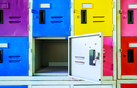 Rows of different colors metal lockers, select focus.の写真素材