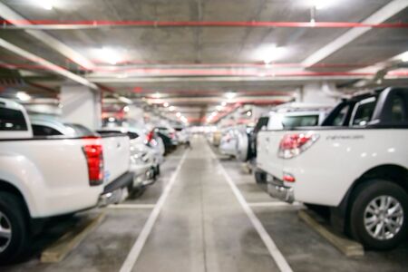 Blurred Parking Lot with bokeh light Backgroundの写真素材