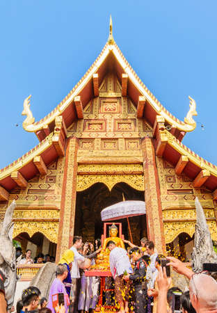 CHIANG MAI THAILAND - APRIL 13, 2016 : Chiangmai Songkran festival. Buddha Phra Singh of Phra Singh temple was moved to the parade cars for pour water around city.の写真素材