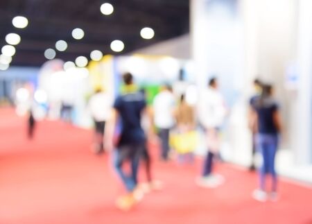 Blurred image of open exhibition with people for backgroundの写真素材