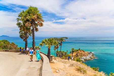 PHUKET, THAILAND - MAY 6, 2016: Tourists enjoying the sea view of Phromthep Cape, Phuket island, Thailand.のeditorial素材