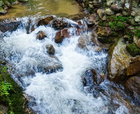 Water Flowing at Mae Kampong Waterfall, Chiang Mai, Thailand.