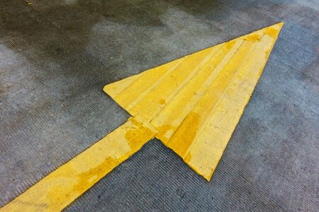 Yellow arrow, Yellow straight sign on asphalt way, Direction arrow.