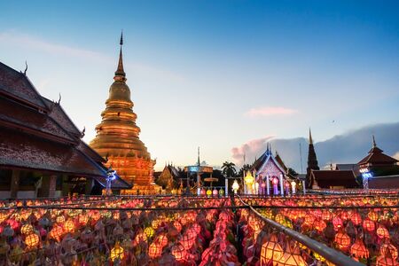 Wat Phra That Hariphunchai temple with colorful lanterns Festival in twilight, Lamphun or Lampoon province, Thailand.のeditorial素材