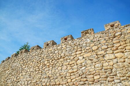 stone wall on blue sky  backgroundの写真素材