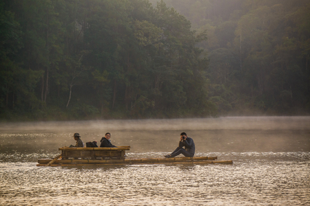 PANG UNG PARK, MAE SONG SON - DECEMBER 10, 2016:  Bamboo raftÂ at Pang ung park in morning with fog on surface lake, Mae Hong Son ,Thailand in December 10, 2016.のeditorial素材