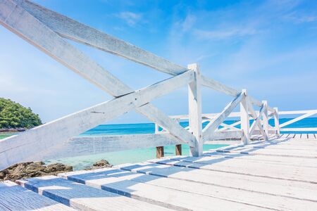 Wooden Bridge beside sea with beautiful seacape in koh lan island, Pattaya, Thailand.の写真素材
