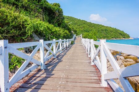 Wooden Bridge beside sea with beautiful seacape in koh lan island, Pattaya, Thailand.の写真素材