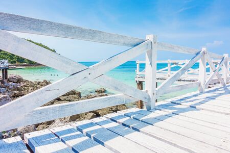 Wooden Bridge beside sea with beautiful seacape in koh lan island, Pattaya, Thailand.の写真素材