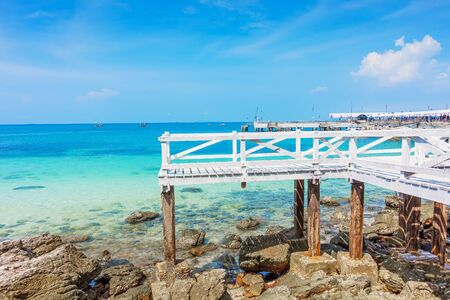 Wooden Bridge beside sea with beautiful seacape in koh lan island, Pattaya, Thailand.の写真素材