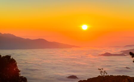 Morning sunrise over mist , Huai Nam Dang National Park, Chiang Mai, Thailand, landscape, travel and nature conceptの写真素材