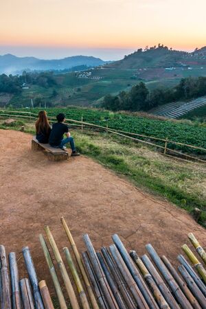 CHIANG MAI, THAILAND : January 28, 2017, Rear view of a romantic couple looking sunset over Mon Cham hill in sunset, Chiang Mai, Thailand.のeditorial素材