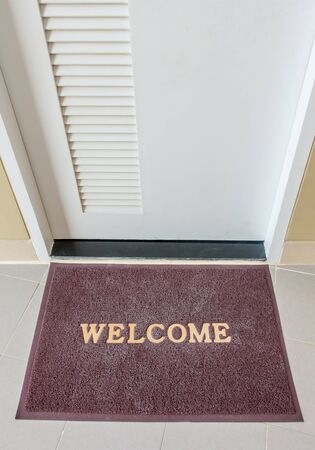 Welcome carpet, welcome doormat carpet on front door.の写真素材