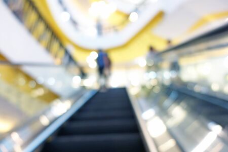 blurred people passenger on escalator for backgroundの写真素材