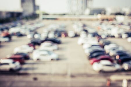 Blurred outdoor Parking Lot with Retro filter background.の写真素材