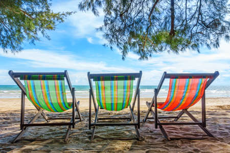 Bench chairs and white sand in summer time, Summer holiday and vacation conceptsの写真素材