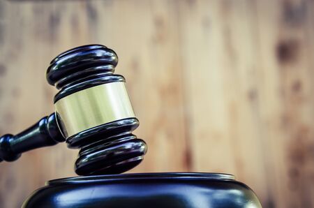 Wooden judge gavel and soundboardの写真素材