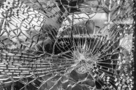 Broken Car Glass Window, selective focus close-up.