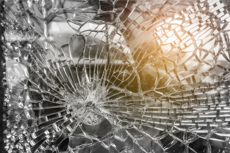 Broken Car Glass Window, selective focus close-up.