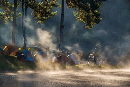 Morning in Pang Ung Lake, Tourist place where people come to vacation in the winter in North of Thailand, Selective Focus.のeditorial素材