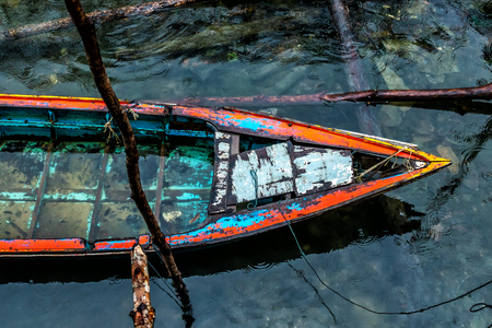 Head wooden boat in the riverの写真素材