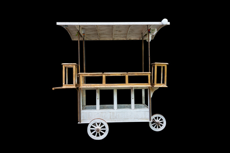 Vintage foods and snacks cart isolated on black background.の写真素材
