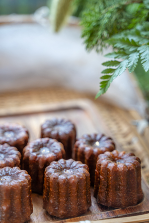 Caneles de bordeaux is a small pastry with rum and vanilla, traditional French sweet dessert.の写真素材