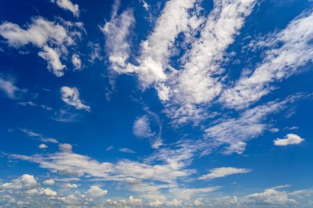 White clouds and bright blue sky background