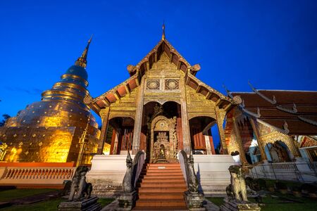 Famous Temple in Blue sky twilight time. Beautiful traditional architecture at Temple of Chiangmai...