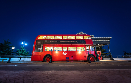 Daegu, South Korea - November 5, 2019: Red Bus on Daegu tower in Night ,  The centre point is the Daegu Tower, a huge observation tower looking out over all of Daeguのeditorial素材