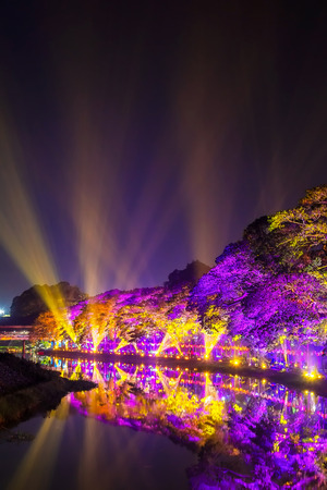 LAMPHUN, THAILAND - NOVEMBER 10, 2019 : Symphony of Lights is the spectacular light and sound show at City Wall beside the river near Wat Phra That Hariphunchai Temple for celebration in Loy Krathong Festival day in Thai old culture.のeditorial素材