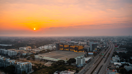 CHIANG MAI, THAILAND - DECEMBER 12, 2019 : Sunrise and office buildings of Chiang Mai in Thailand. Skyline view of cityscape with warm sunlight . Construction business concept.のeditorial素材
