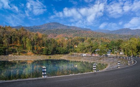 Beautiful view of the crystal clear lake from the water with the mountains in the backgroundの写真素材