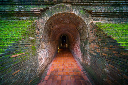Long underground brick tunnel angle shot in Chiang Mai, Thailandのeditorial素材