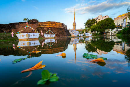 Chiang Mai Thailand - November 16 , 2021: Big ships basket floating on water old city fort of the corner name Katam Corner,  Loy Krathong Festival , The word krathong refers to basket and loy means to floatのeditorial素材