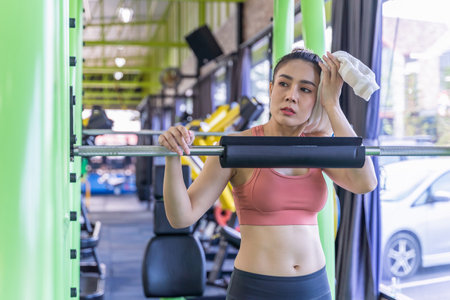 Fitness woman exercise workout in gym fitness breaking relax.