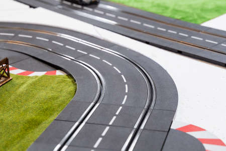 The toy race track. Miniature race cars on a race track. racing track toy. Selectivr Focusの写真素材
