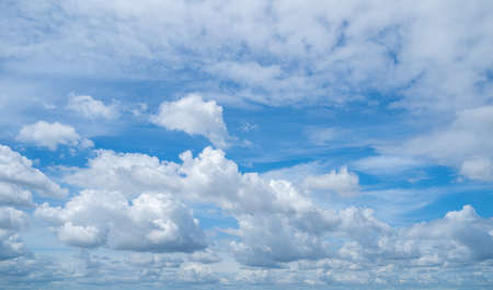 Peaceful blue sky with many white clouds. Beauty clear cloudy in sunshine calm bright winter. Environment day horizon skyline view summer wind.の写真素材