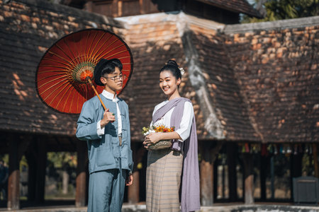 Chiangmai Province, Thailand, 13 October 2022 : Asian Youth with Thai clothes in the northern style go to temples to preserve traditions.のeditorial素材