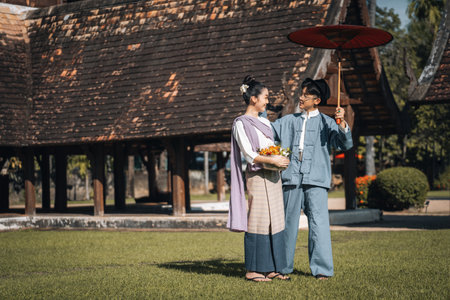 Chiangmai Province, Thailand, 13 October 2022 : Asian Youth with Thai clothes in the northern style go to temples to preserve traditions.のeditorial素材