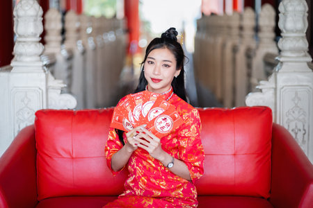 Chinese new year festival celebration. Portrait of Beautiful asian woman in traditional Chinese...