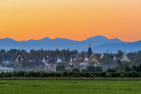 Wat Den Salee Sri Muang Gan or Ban Den temple is the most famous landmark in Chiang Mai, Thailand. Thai temple in sunset , twilight.の写真素材
