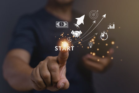 Startup concept with icon business and network connection on modern virtual interface from digital tablet. man touching on tablet. online business, e-comers, online marketing, small business.の写真素材